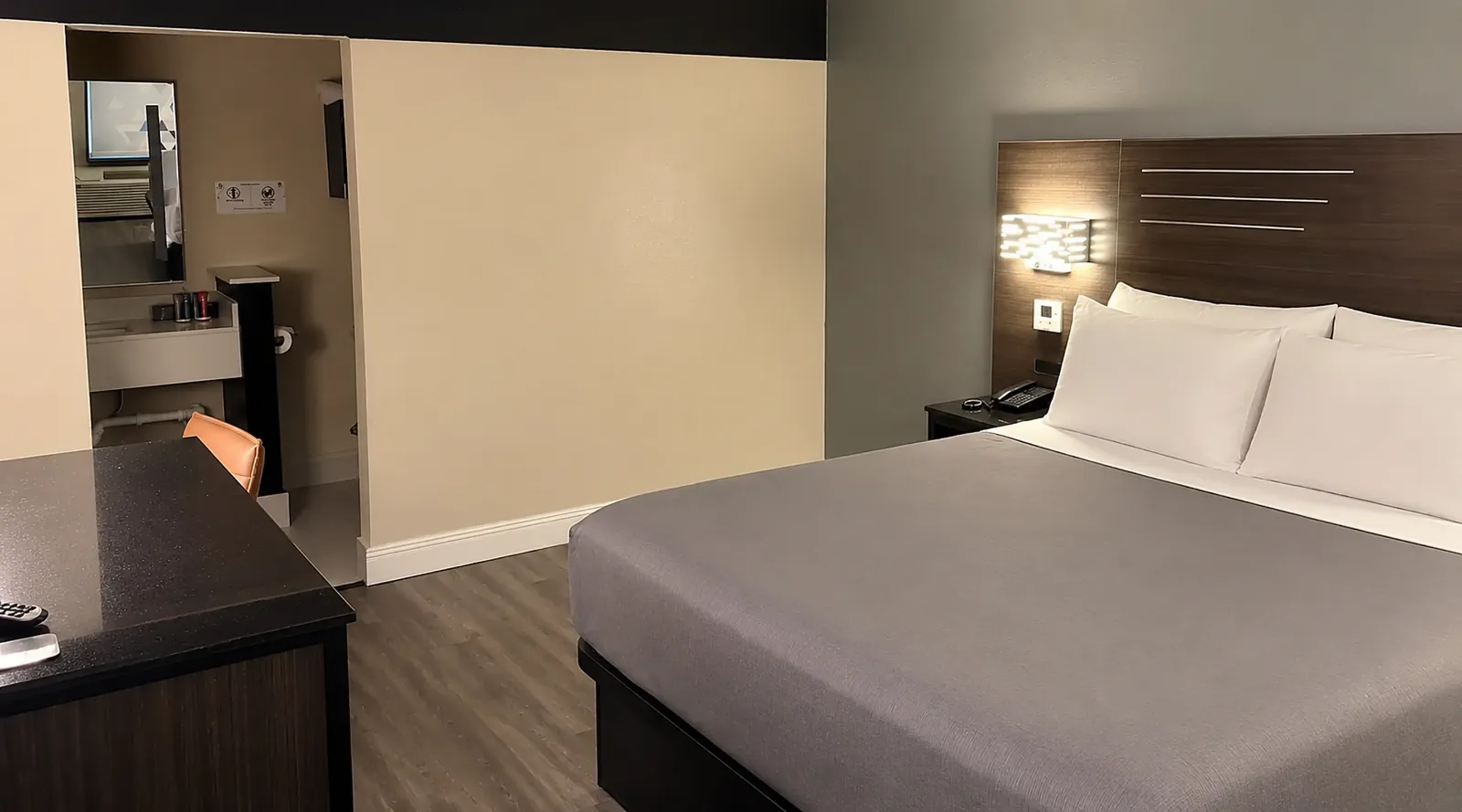 ADA accessible king room at Lx Hotel Manchester TN with work desk and television