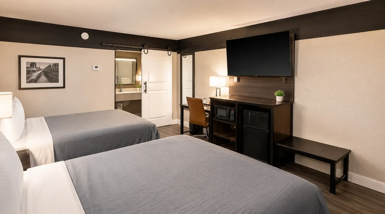 Spacious double queen room at Lx Hotel Manchester TN for families or groups
