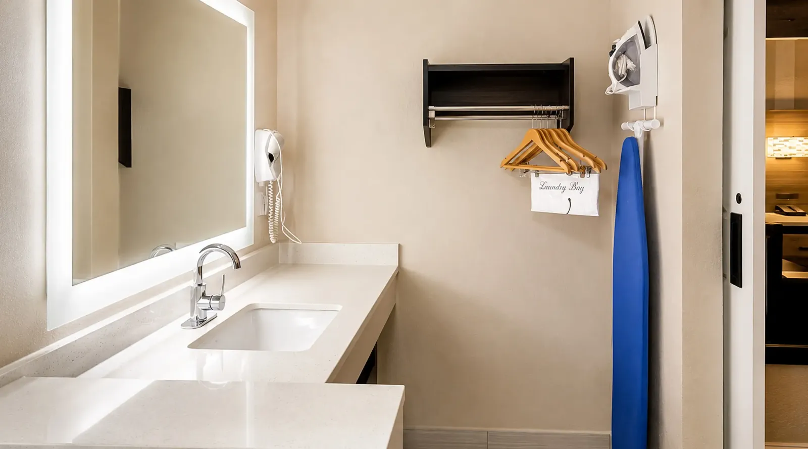 King room ensuite bathroom at Lx Hotel Manchester TN with vanity and shower