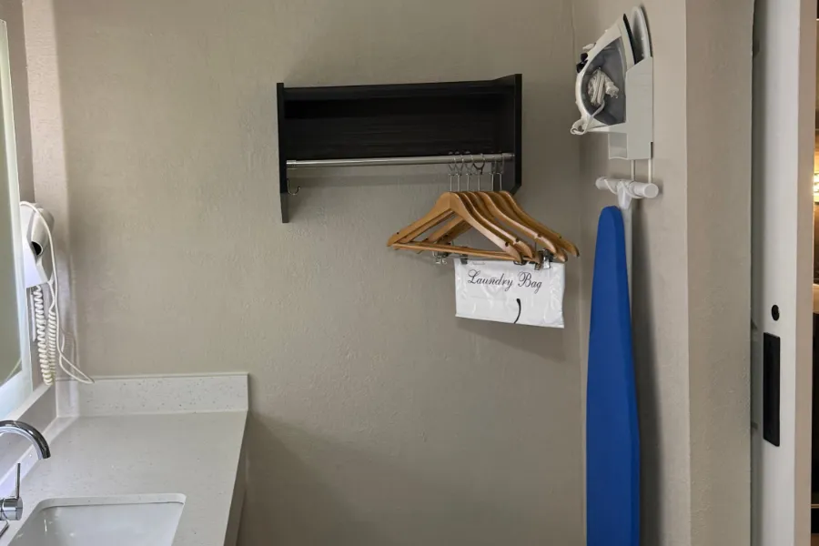 Double queen room bathroom at Lx Hotel with modern fixtures