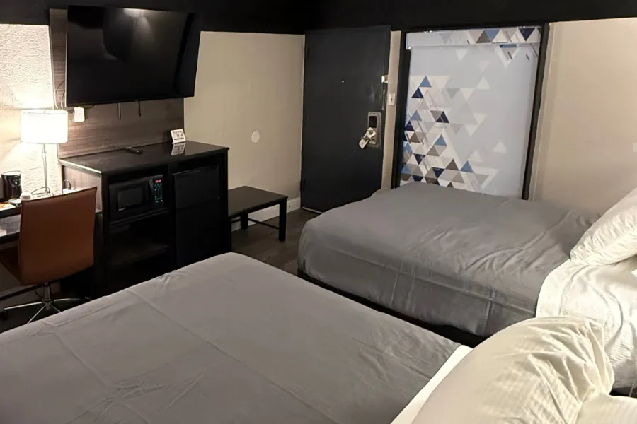 Spacious double queen room at Lx Hotel for families or groups