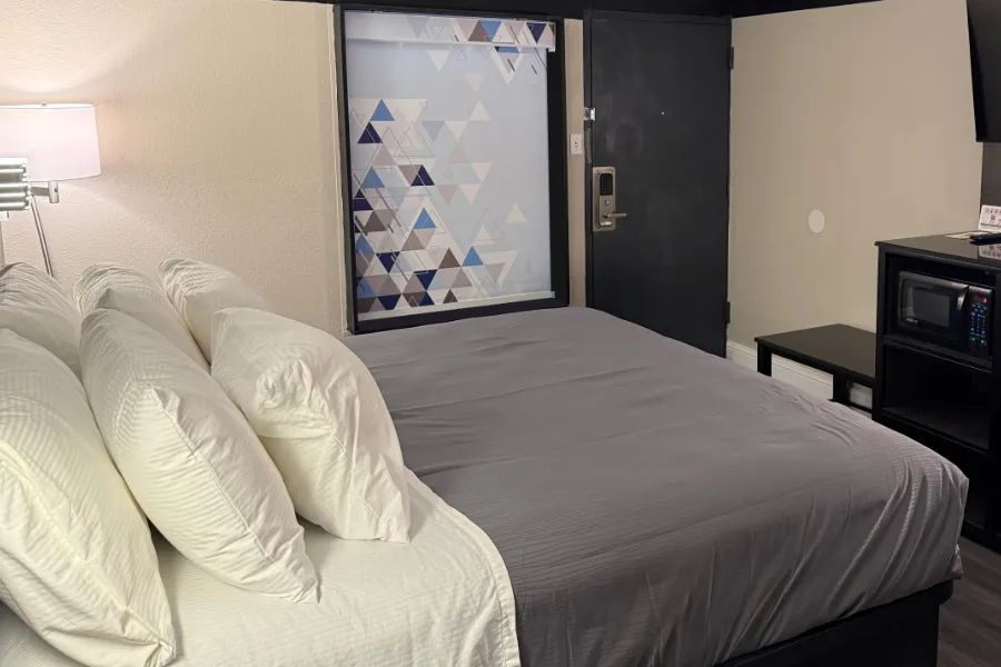 King room at Lx Hotel with seating and work desk